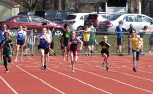 group of young athletes running