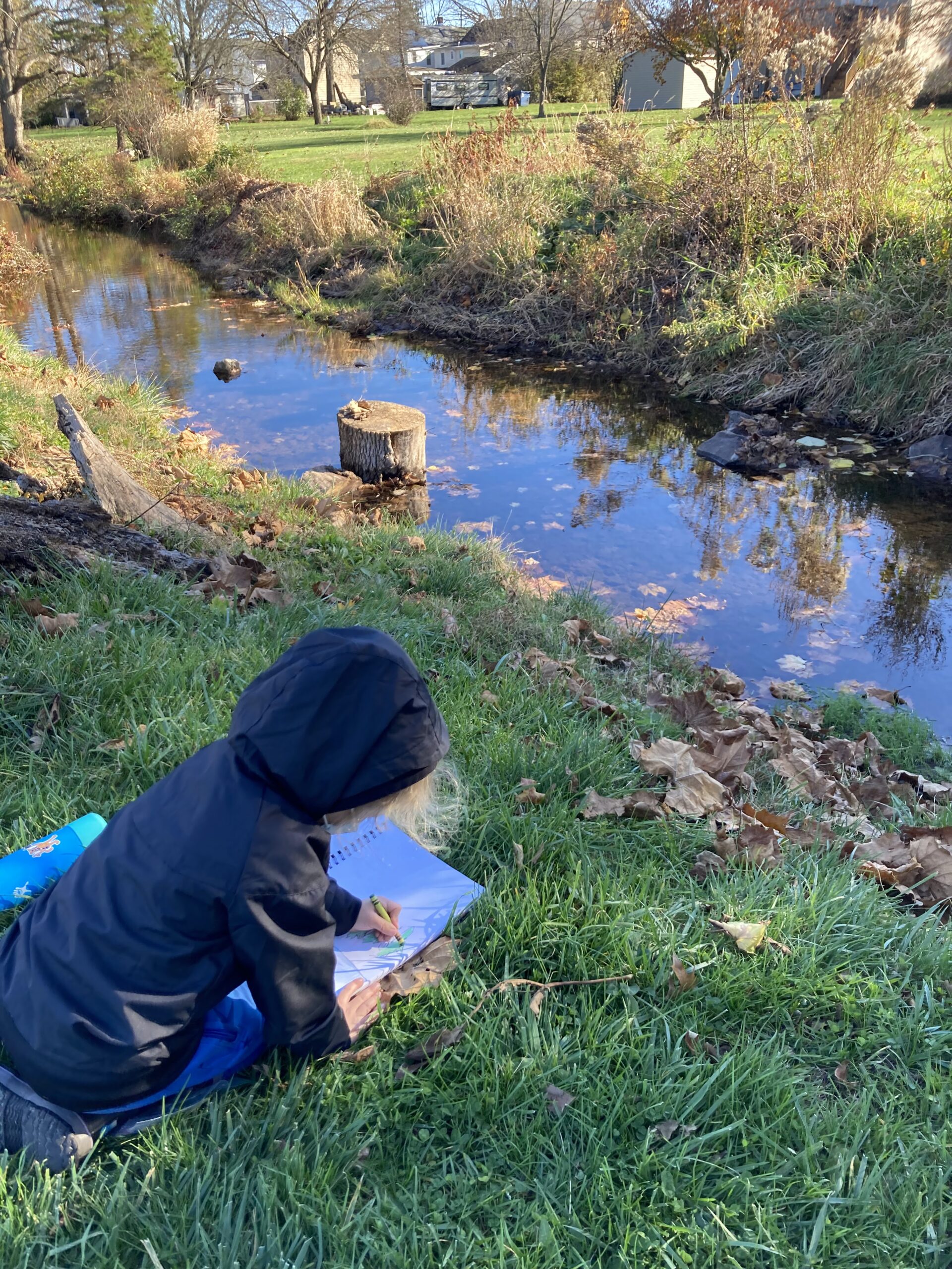 Student by the creek
